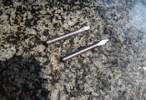 Below on is brand new needle.